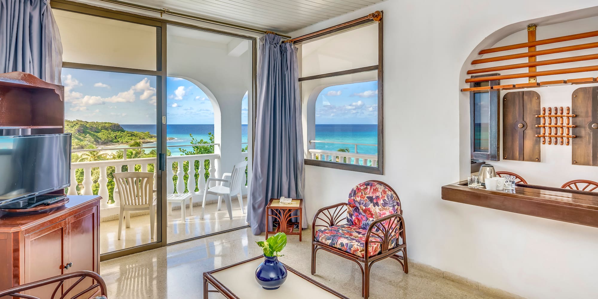 a room with a view of the ocean