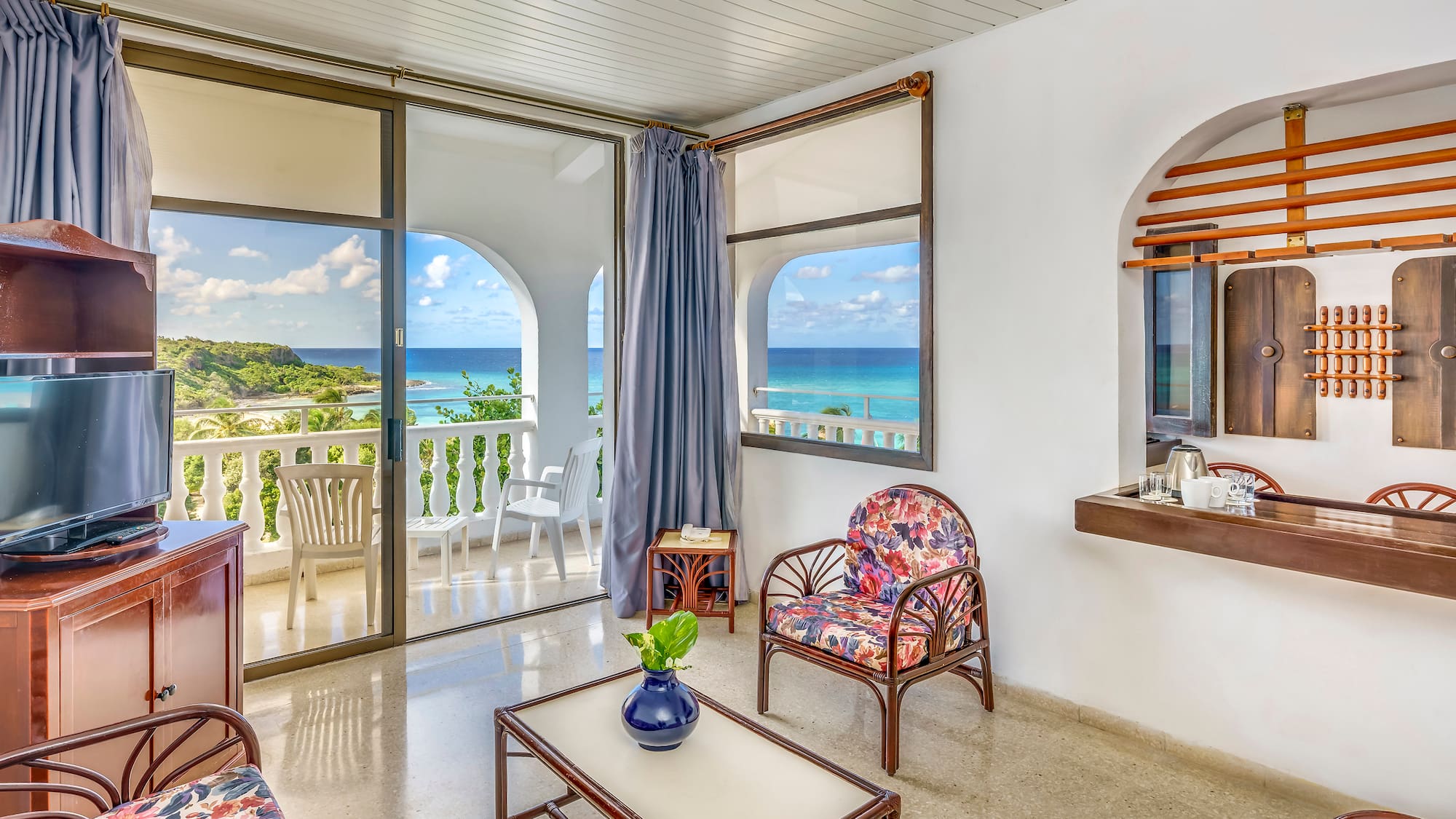 a room with a view of the ocean