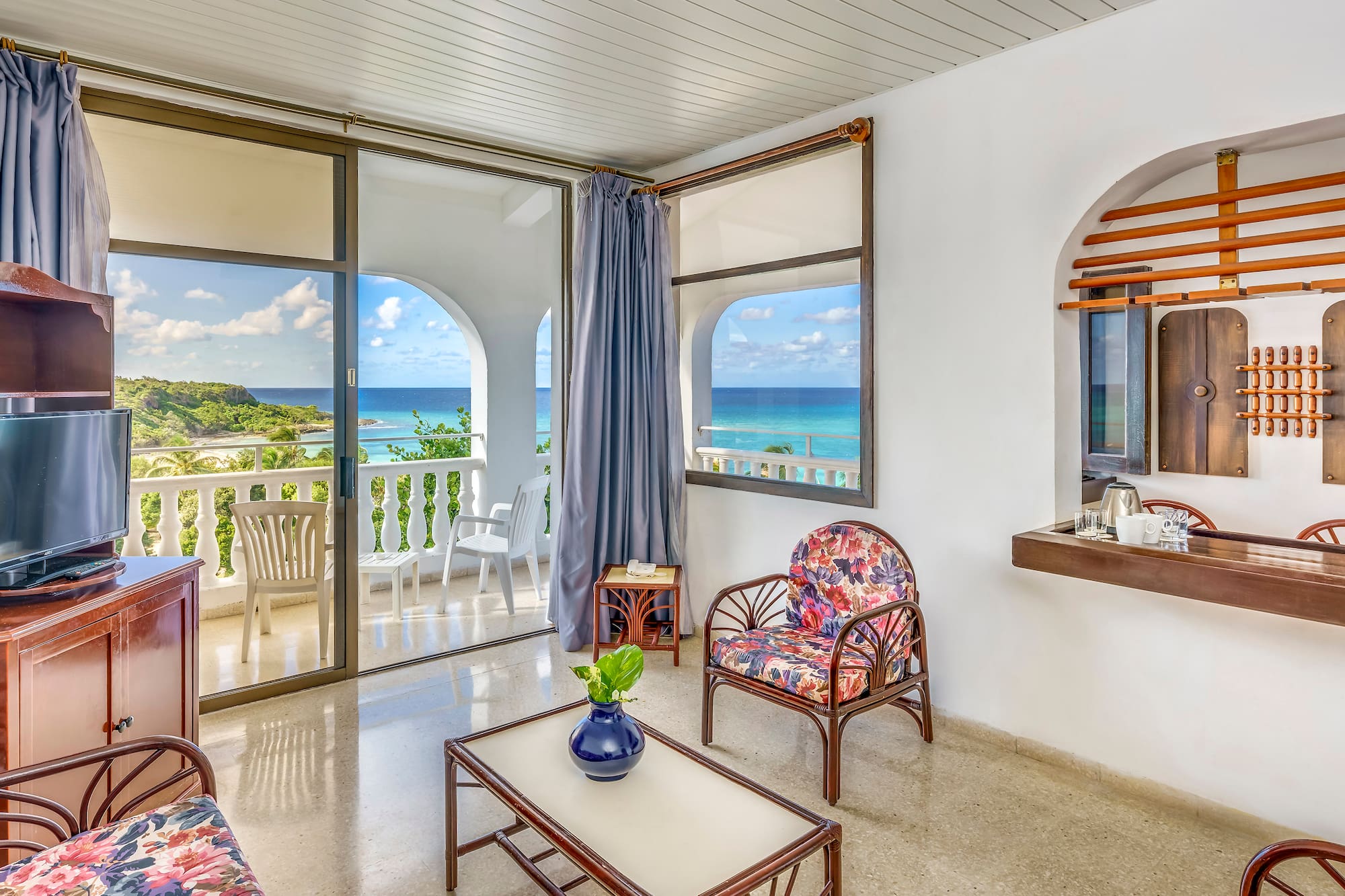 a room with a view of the ocean