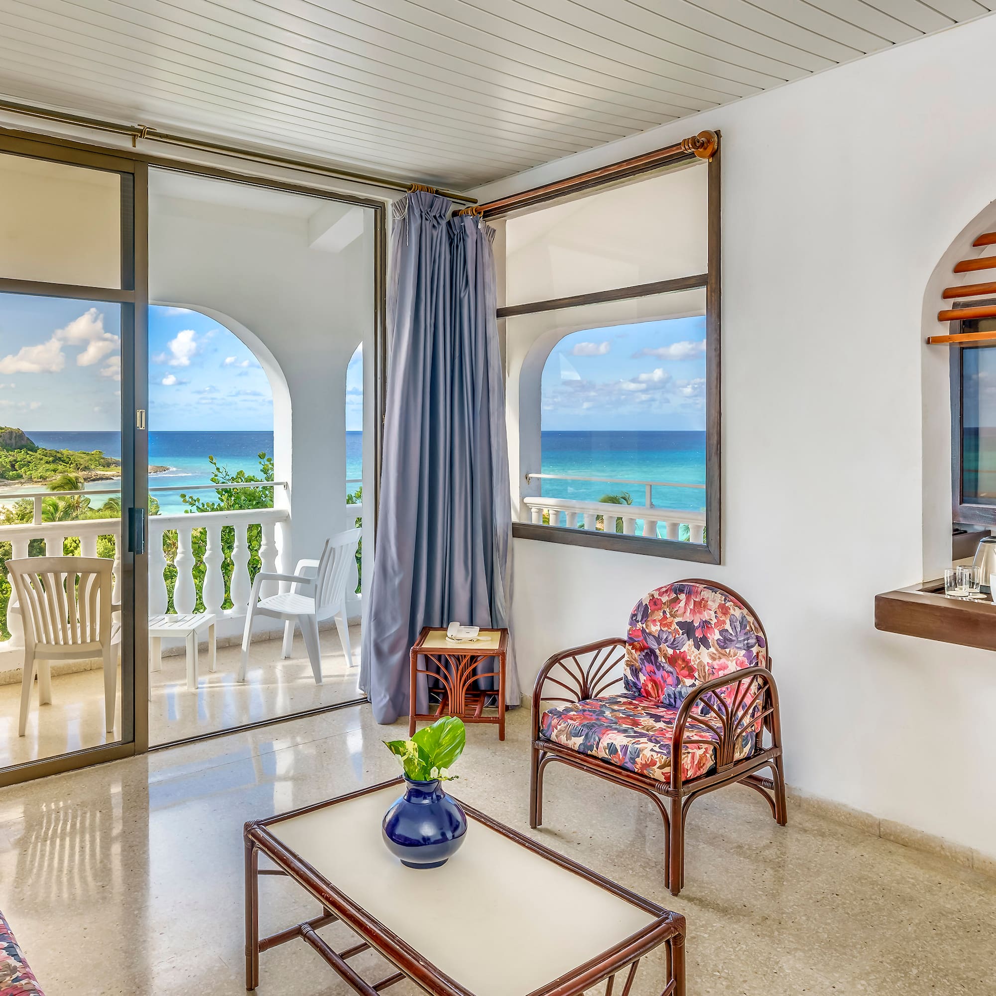 a room with a view of the ocean