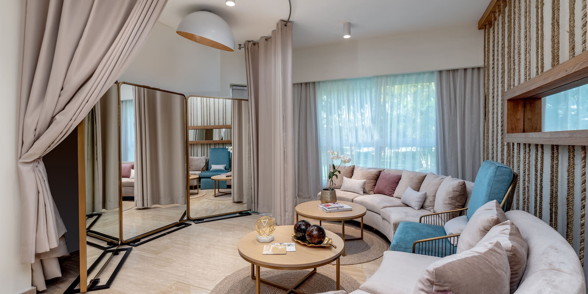 a room with a large mirror and a couch