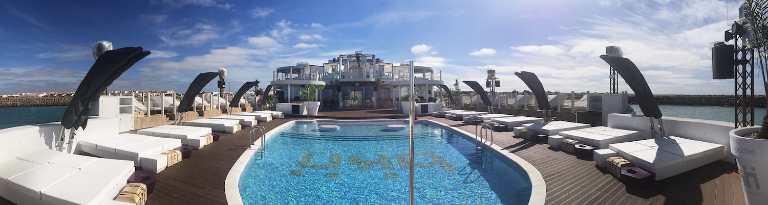 a pool with a building in the background