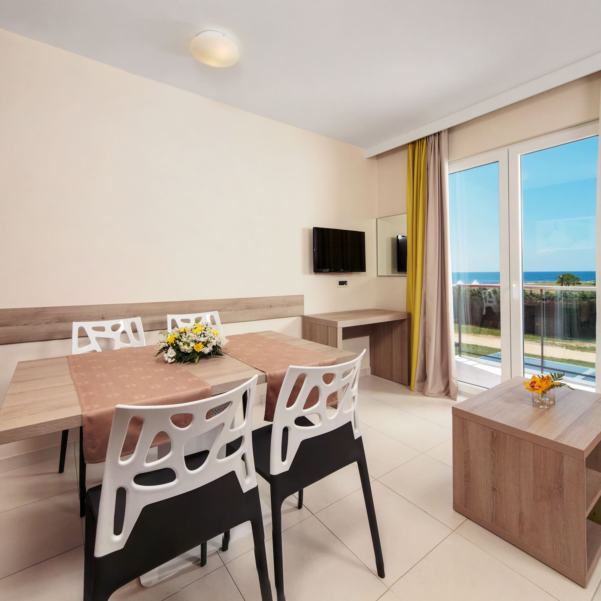 a room with a table and chairs