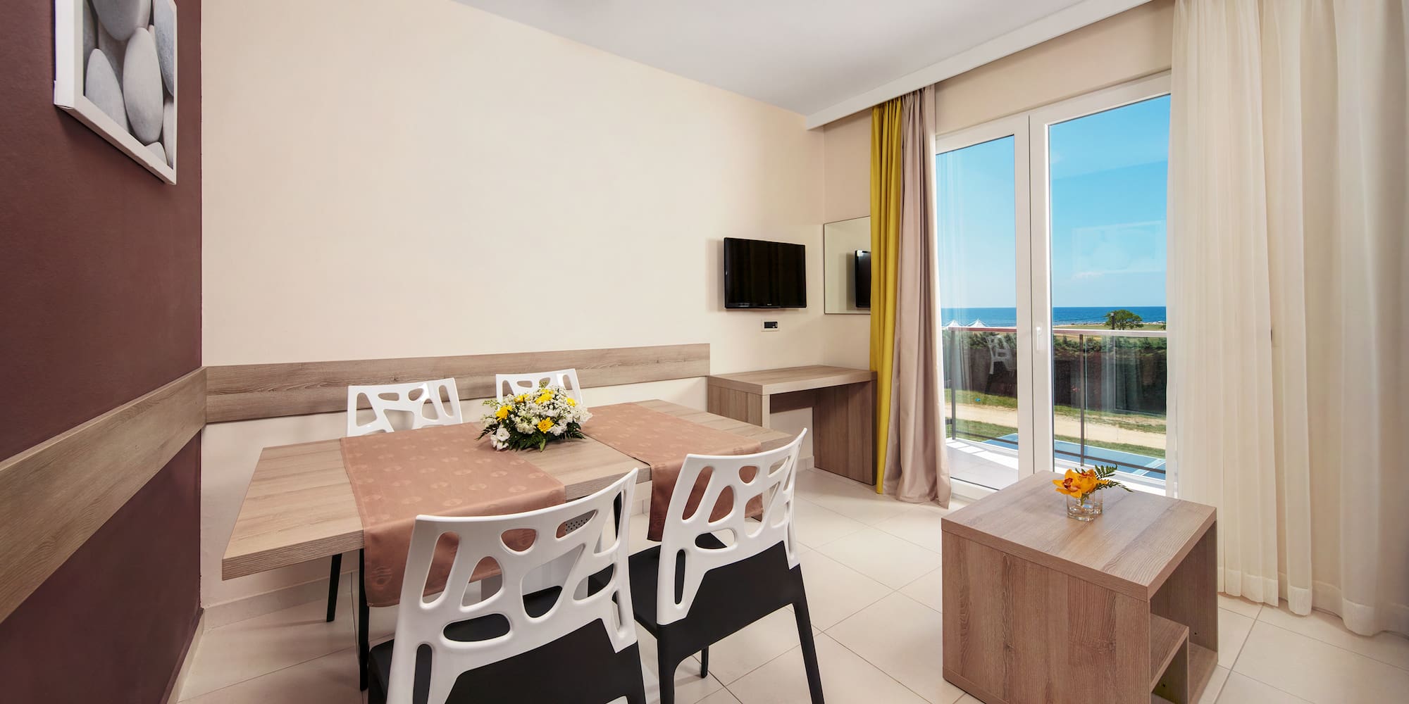 a room with a table and chairs