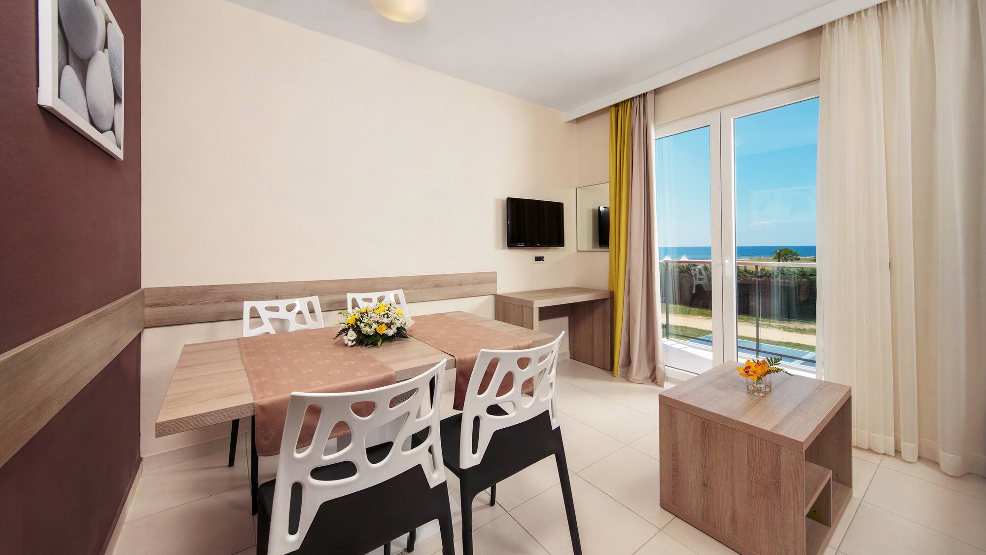 a room with a table and chairs