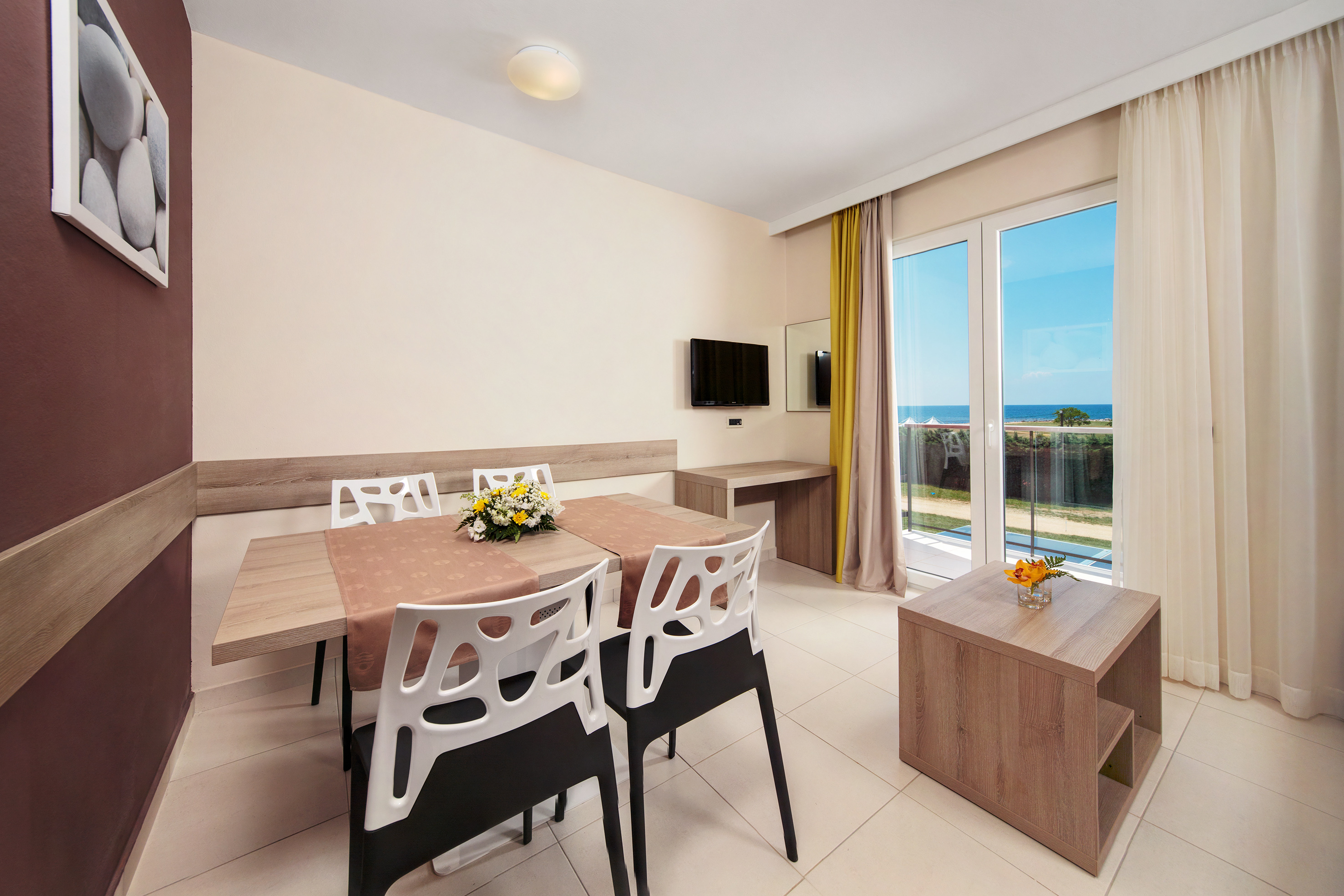 a room with a table and chairs