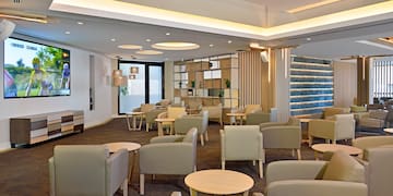 a room with chairs and tables