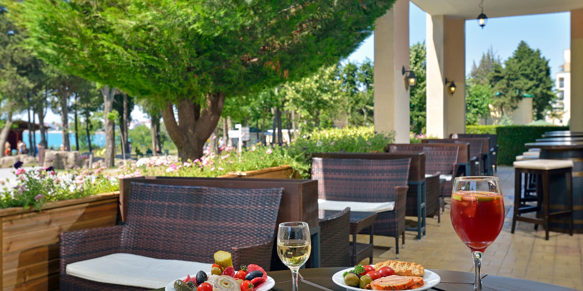 a table with food and wine glasses on it