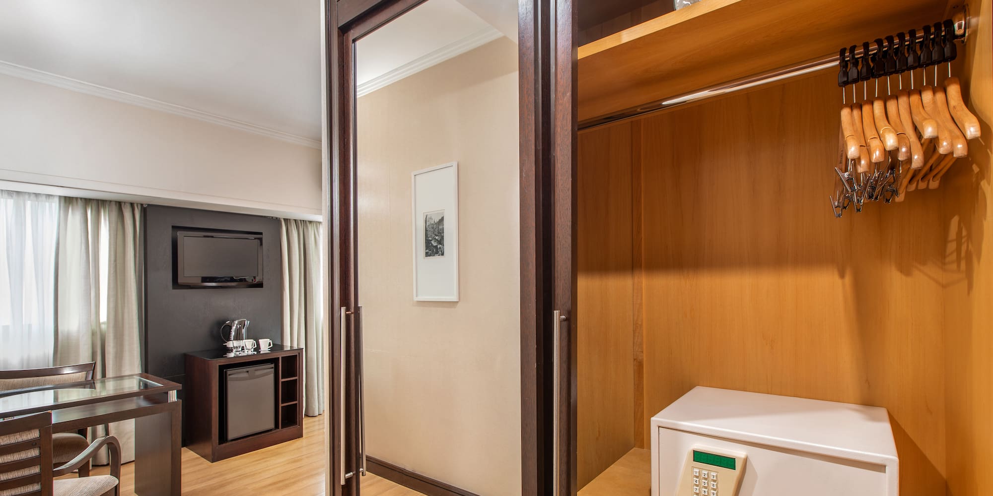 a room with a closet and a television