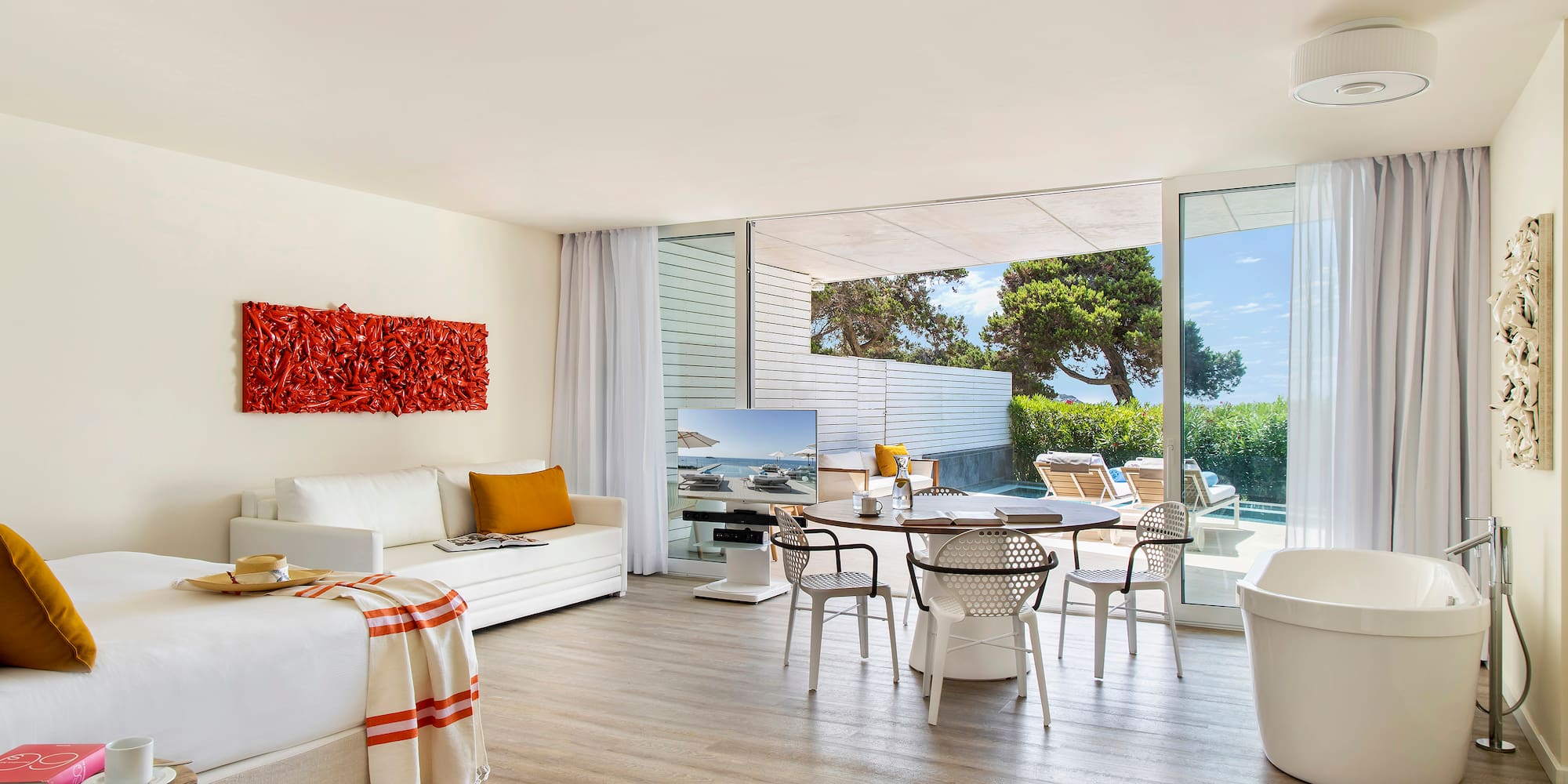 a room with a table and chairs