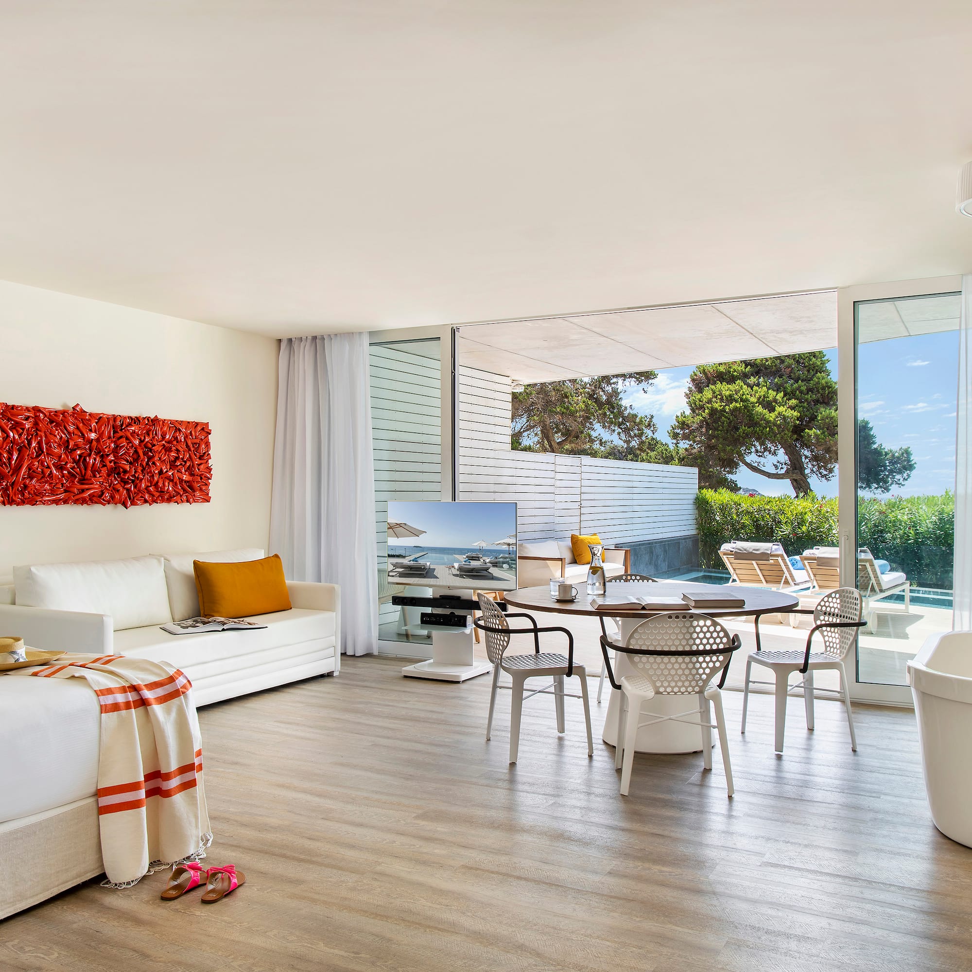 a room with a table and chairs