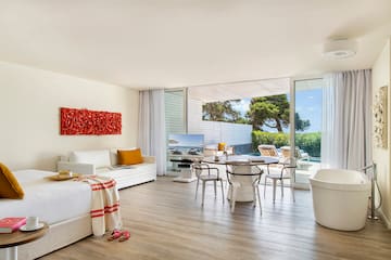 a room with a table and chairs