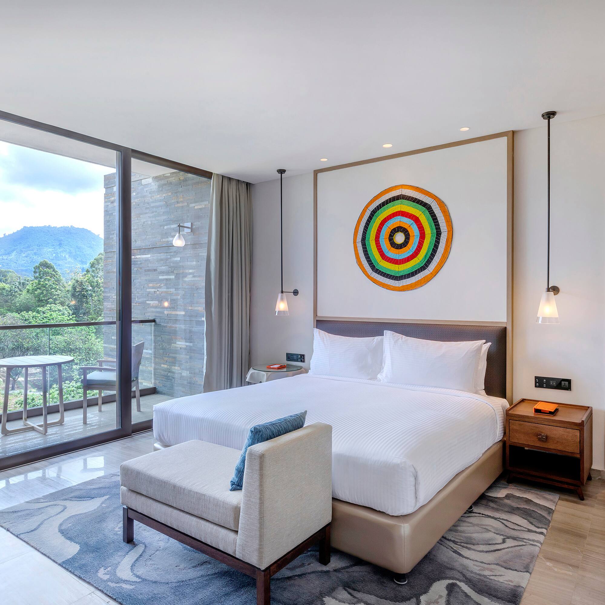 a bedroom with a bed and a chair