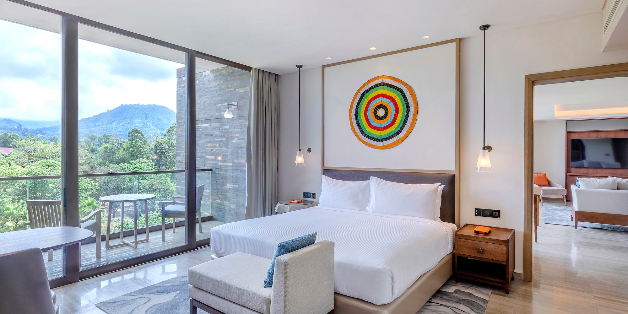 a bedroom with a bed and a chair