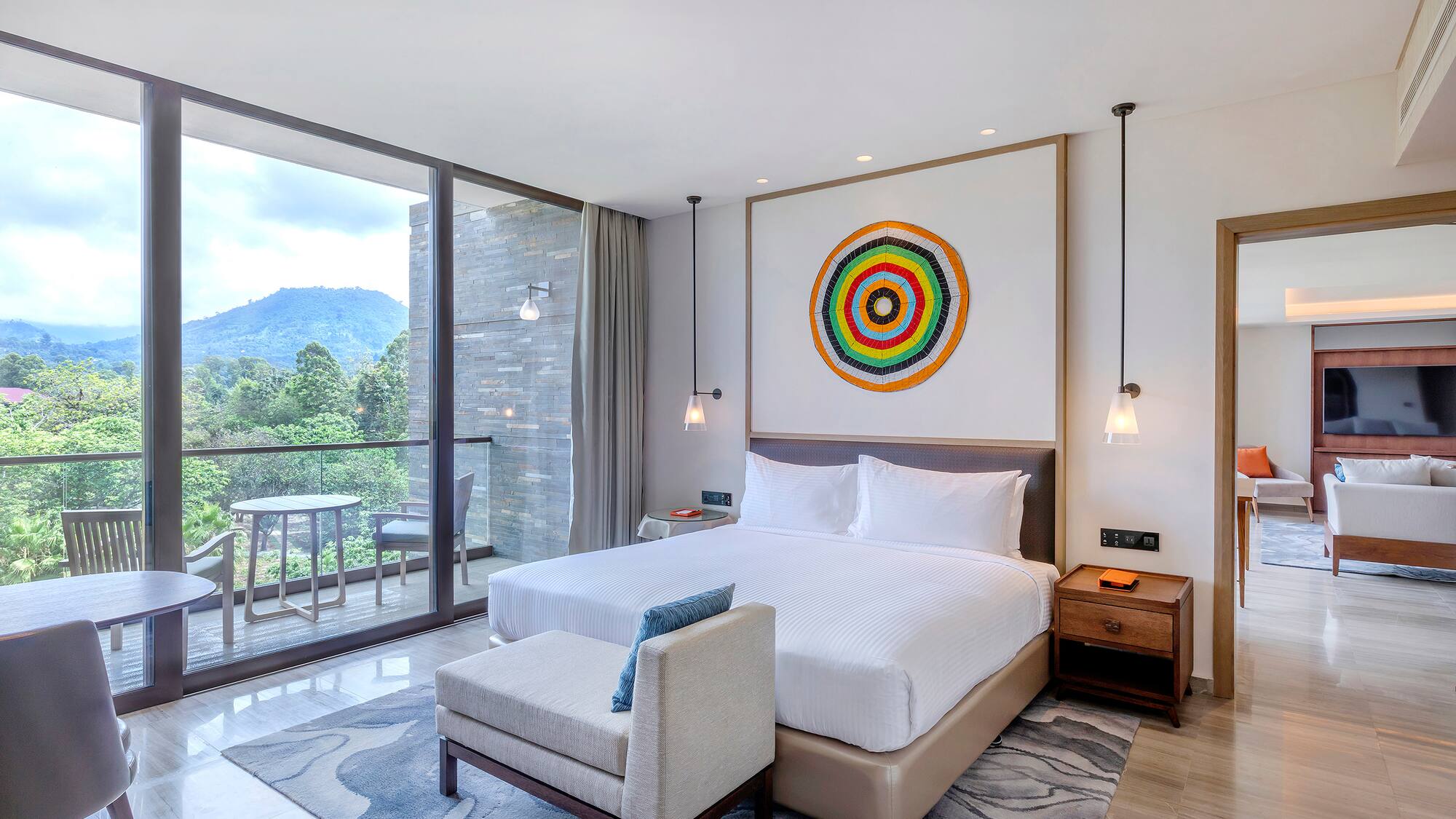 a bedroom with a bed and a chair