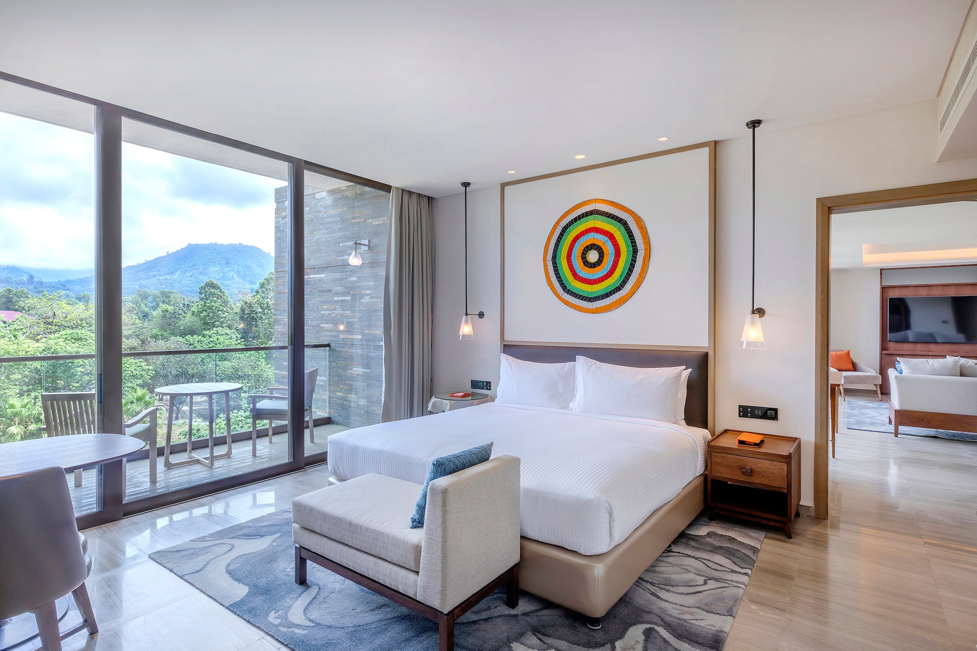 a bedroom with a bed and a chair