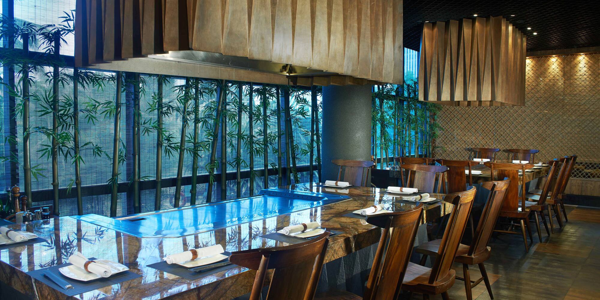 a restaurant with a table and chairs