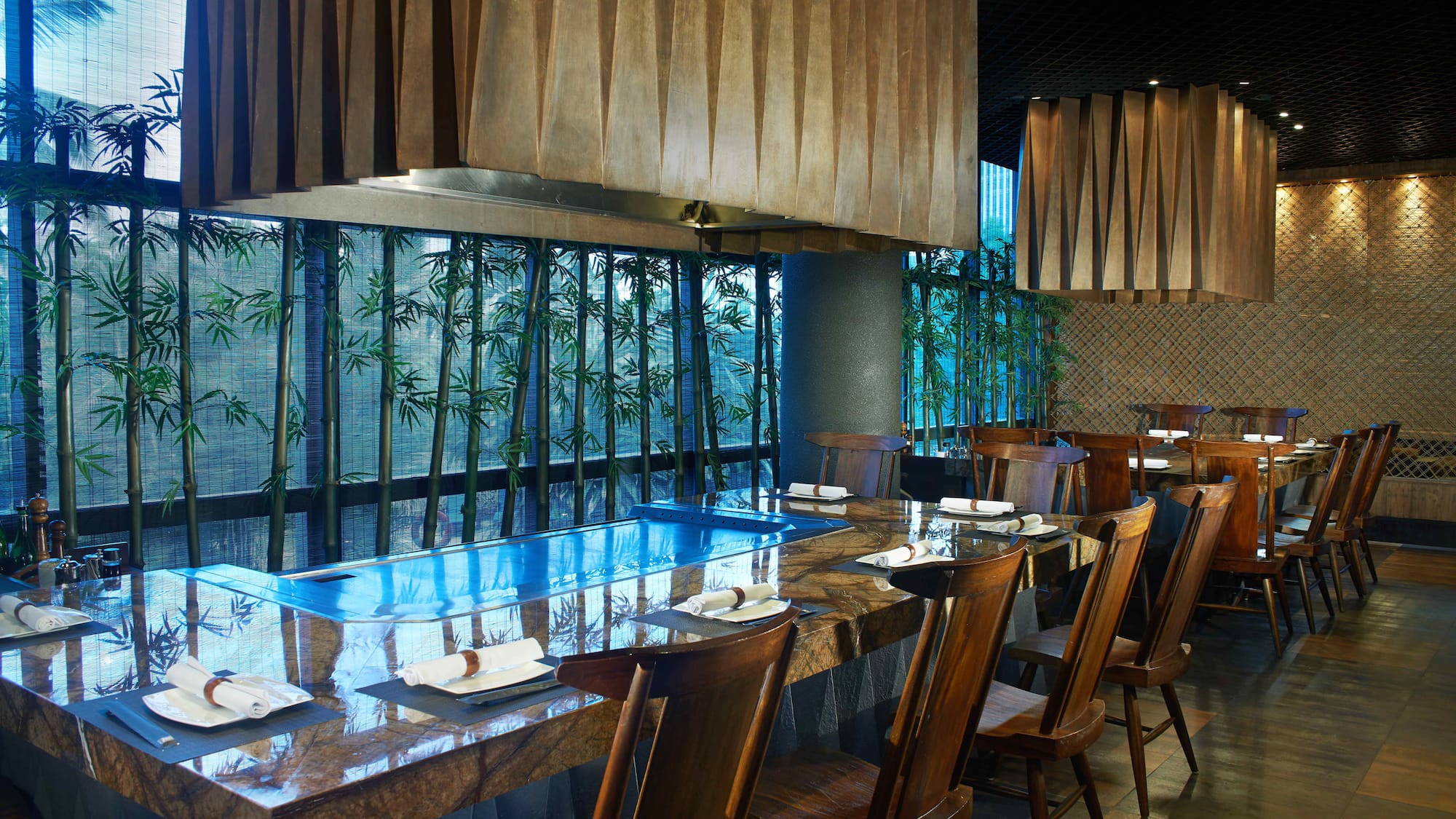 a restaurant with a table and chairs