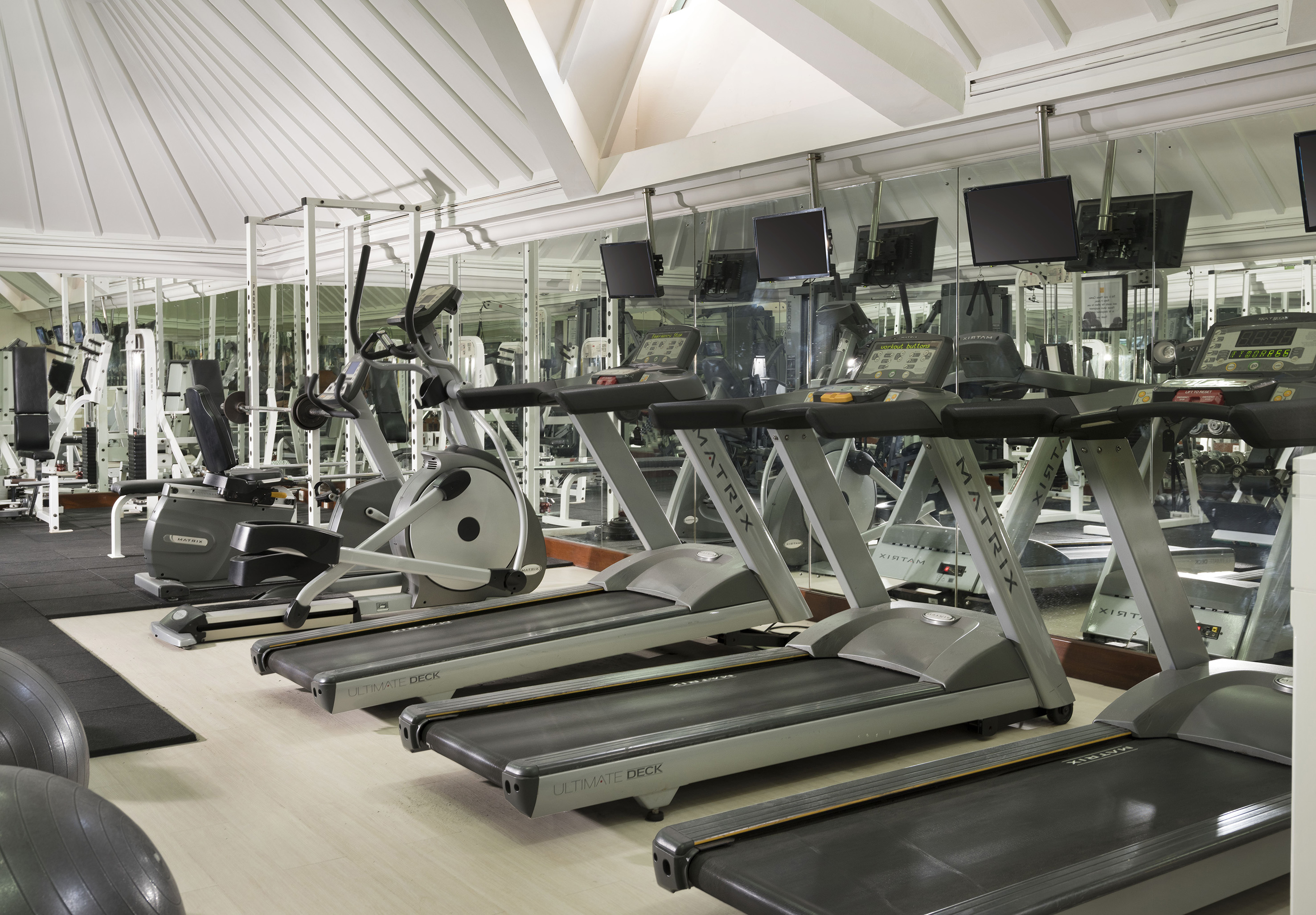 a room with treadmills and exercise machines