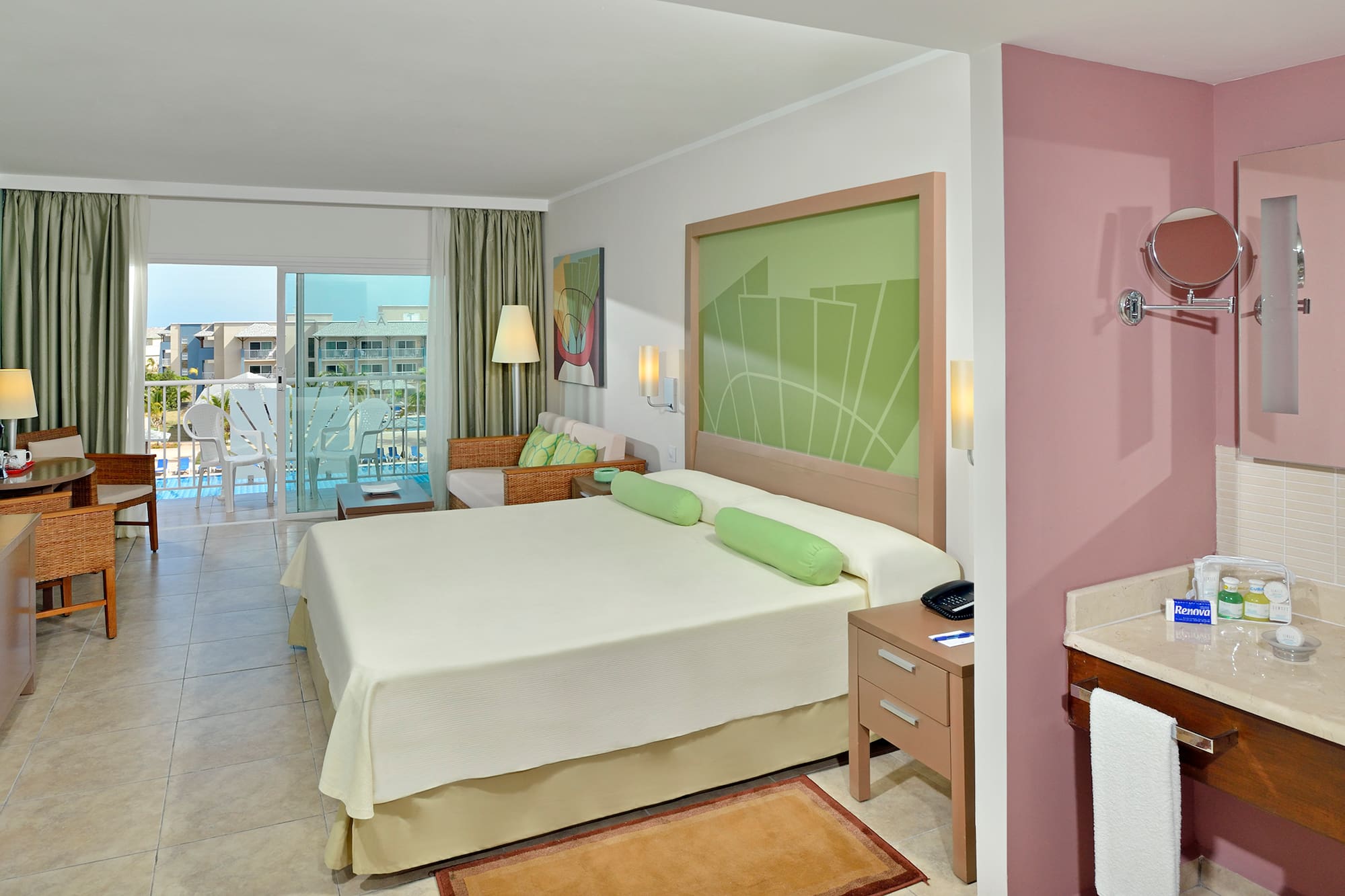 a room with a bed and a sink