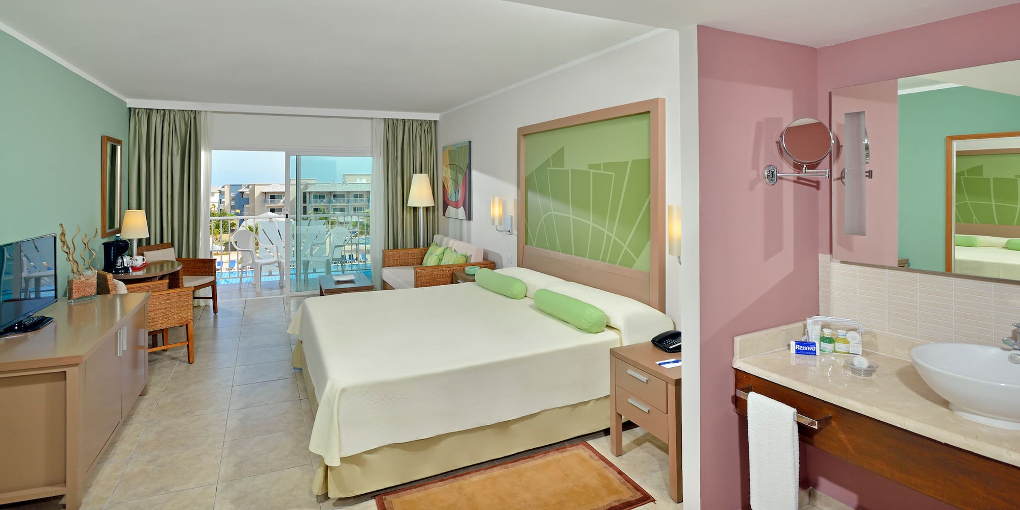 a room with a bed and a sink