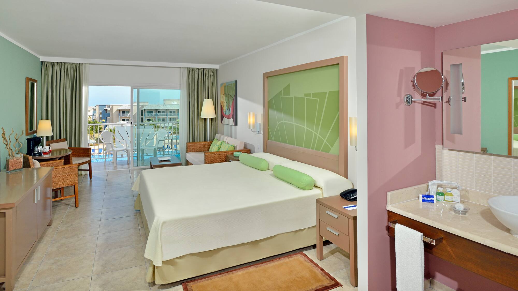 a room with a bed and a sink