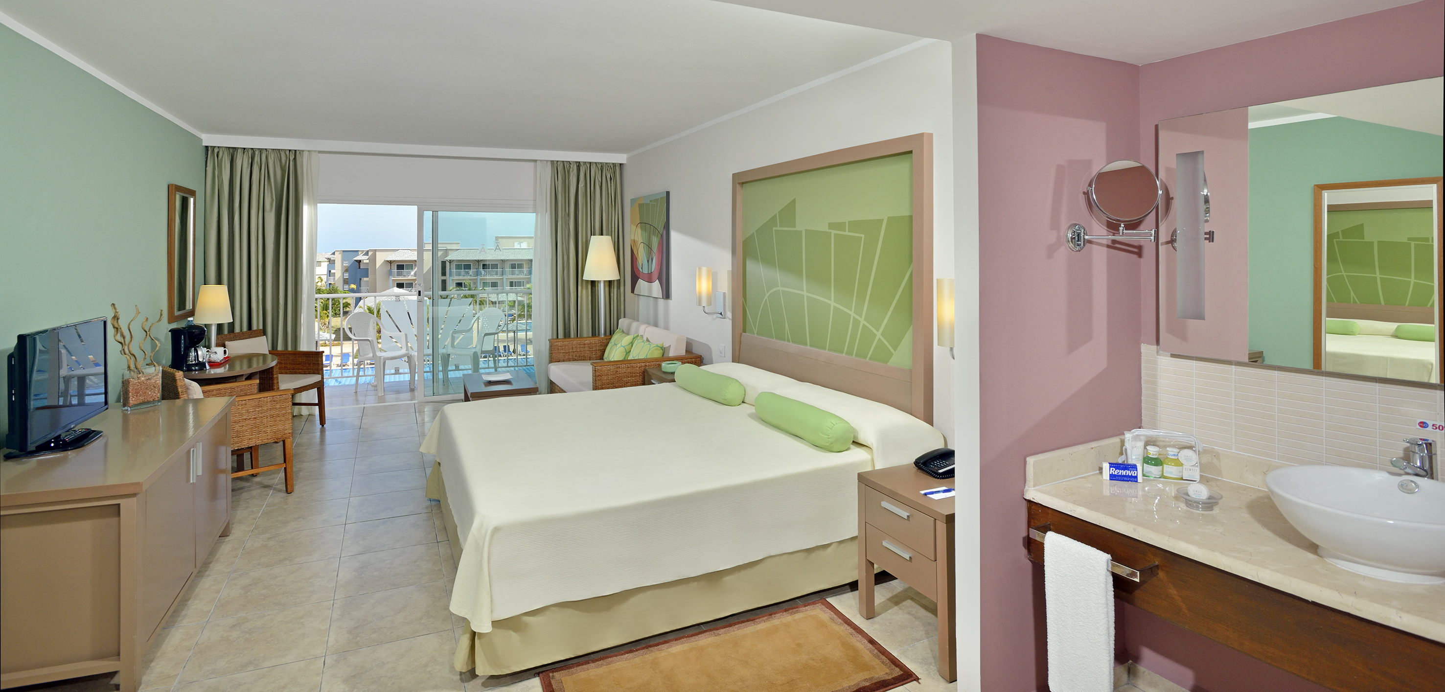 a room with a bed and a sink