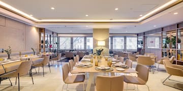 a room with a table and chairs