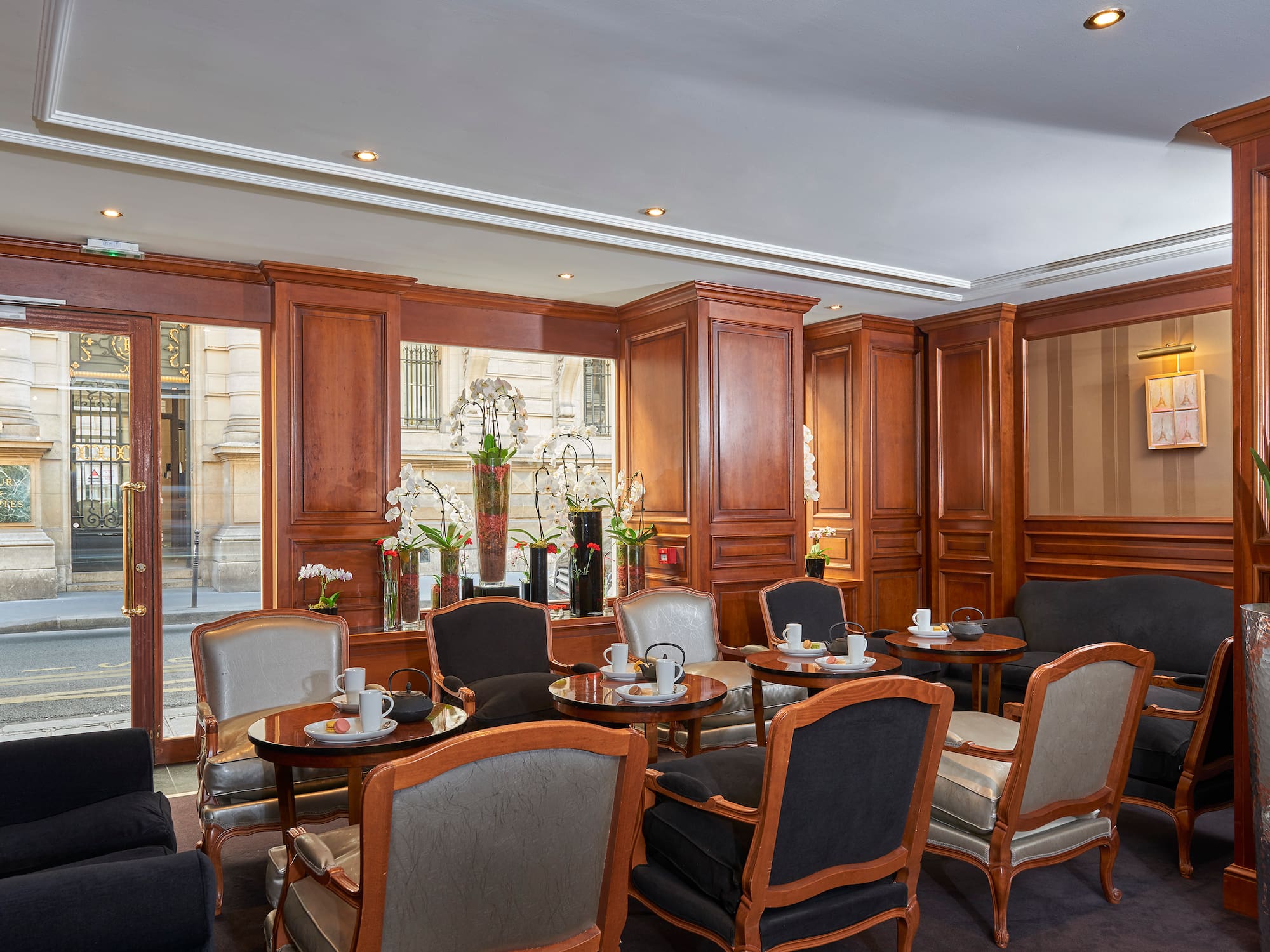 a room with chairs and tables