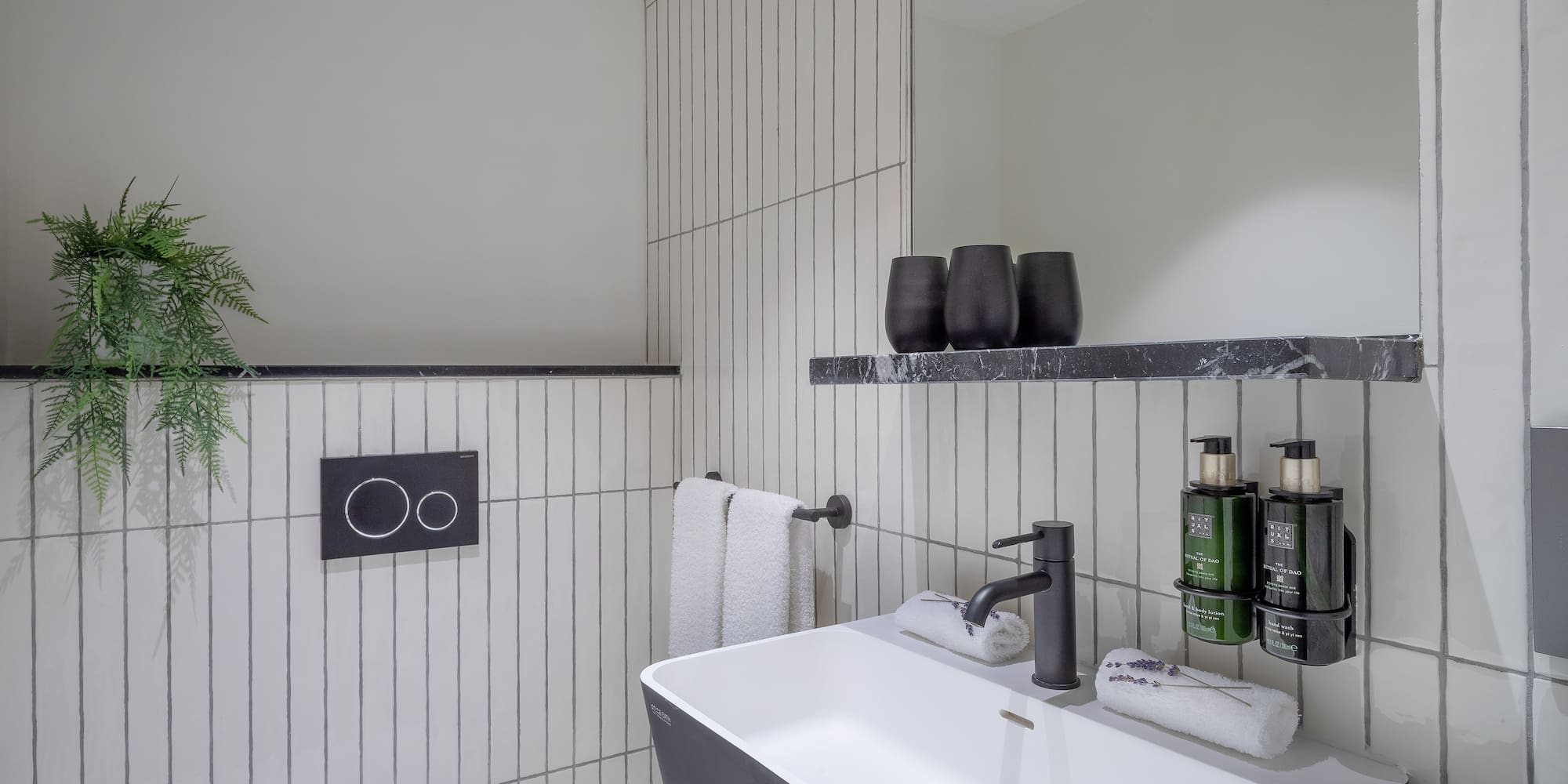 a bathroom with a sink and toilet