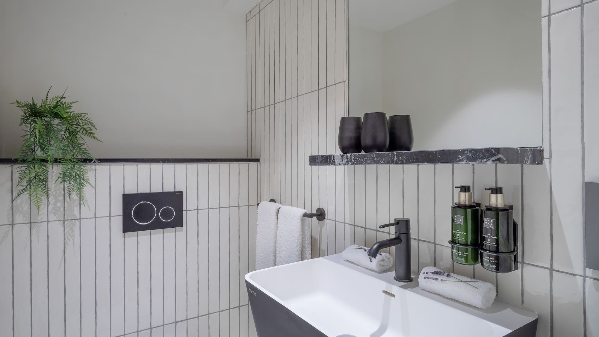 a bathroom with a sink and toilet