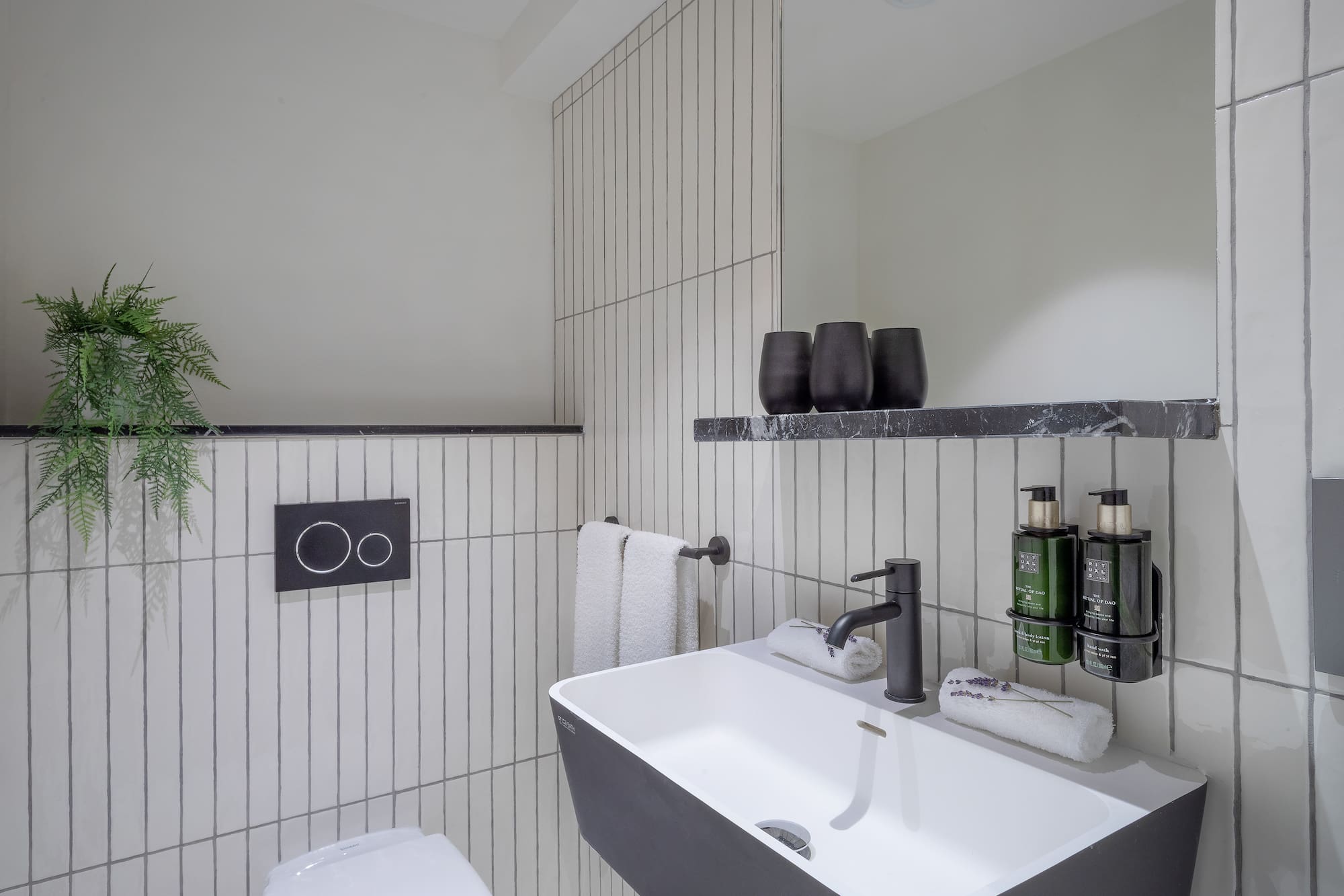 a bathroom with a sink and toilet