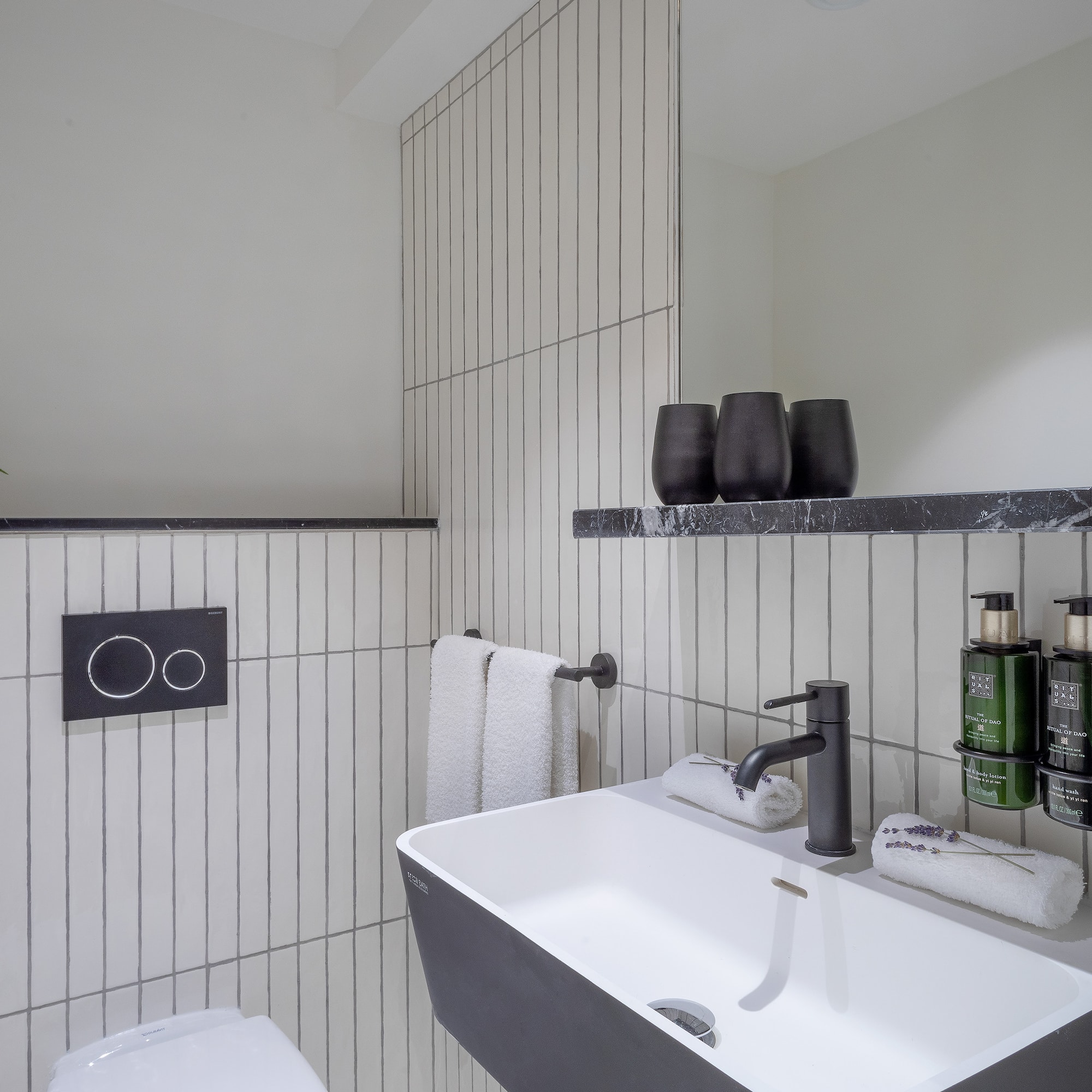 a bathroom with a sink and toilet