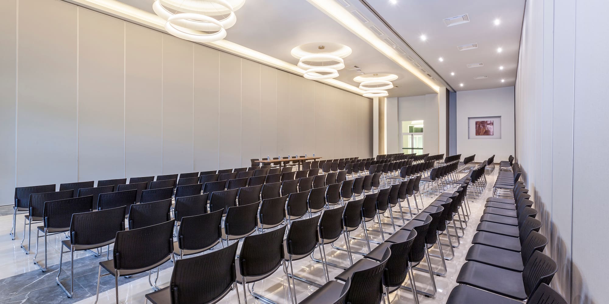 a room with rows of chairs