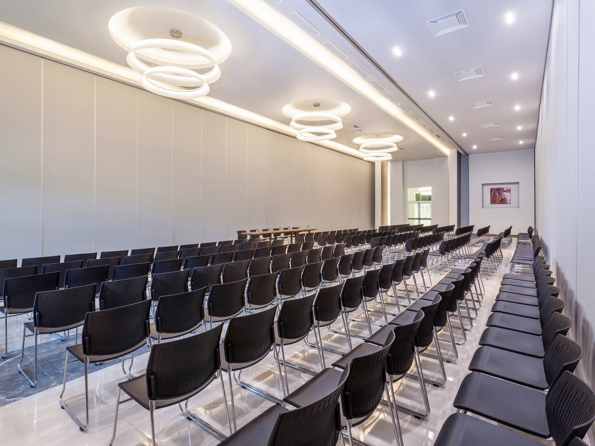 a room with rows of chairs