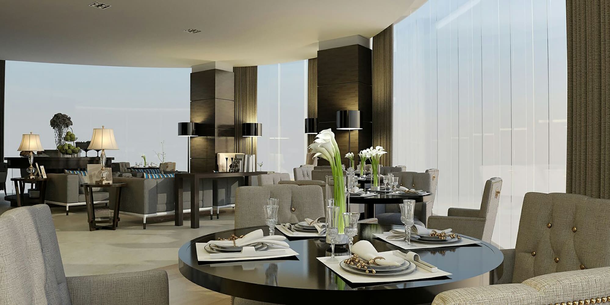 a room with a round table and chairs