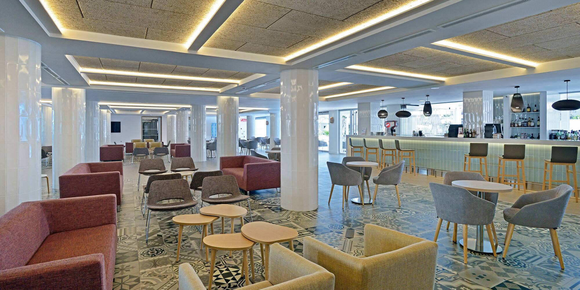 a room with chairs and tables