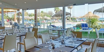 a restaurant with tables and chairs