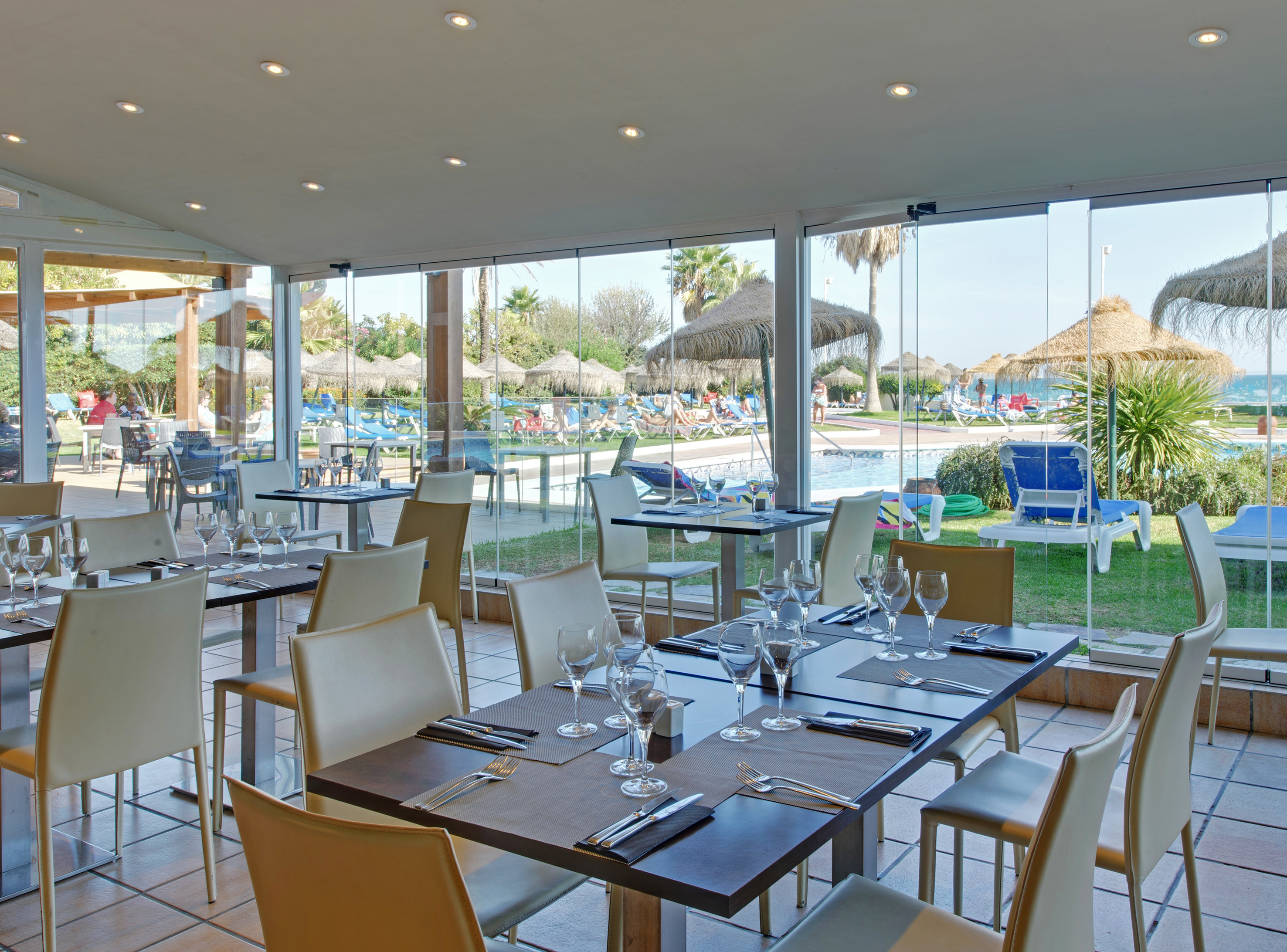 a restaurant with tables and chairs