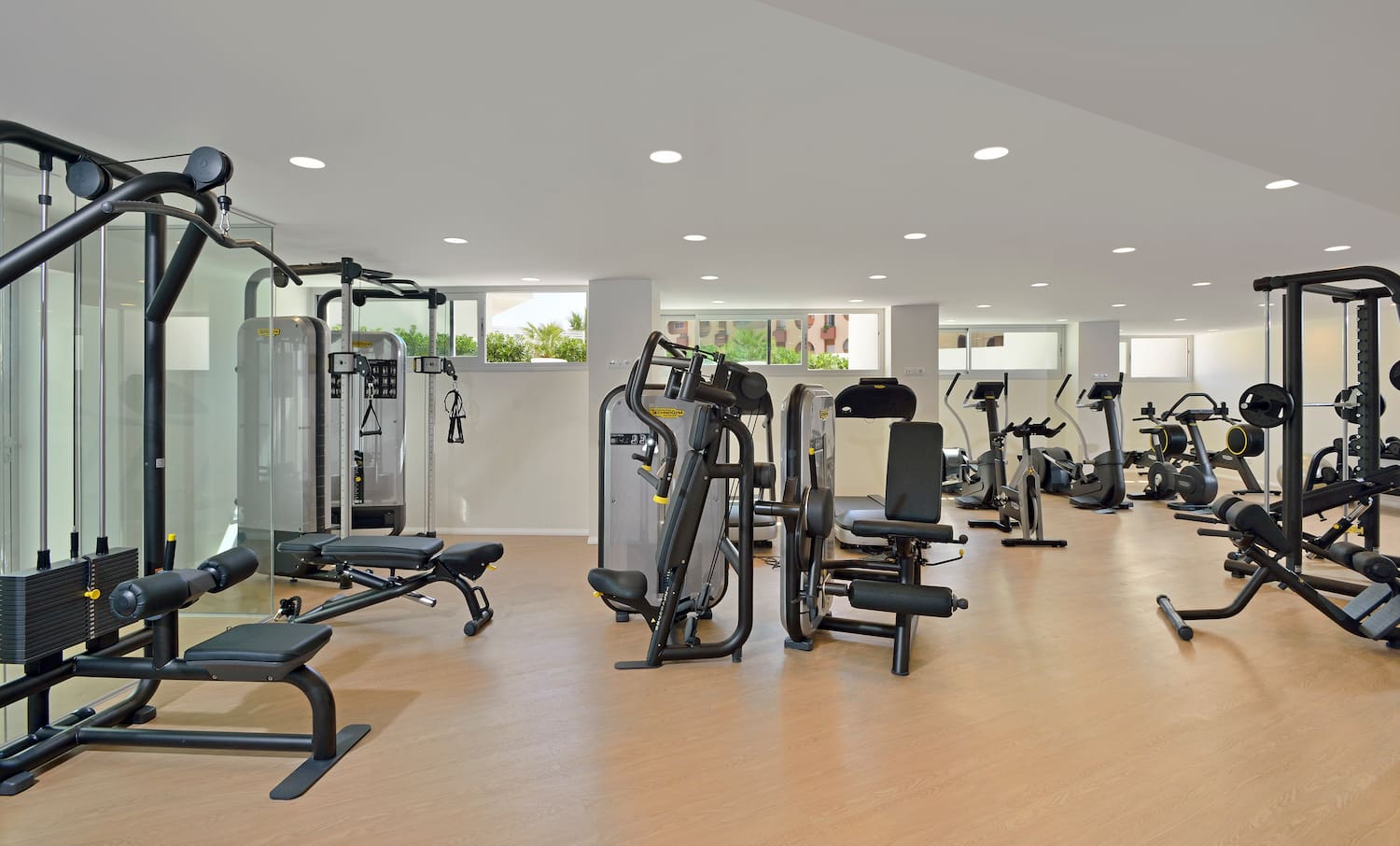 a large room with exercise equipment