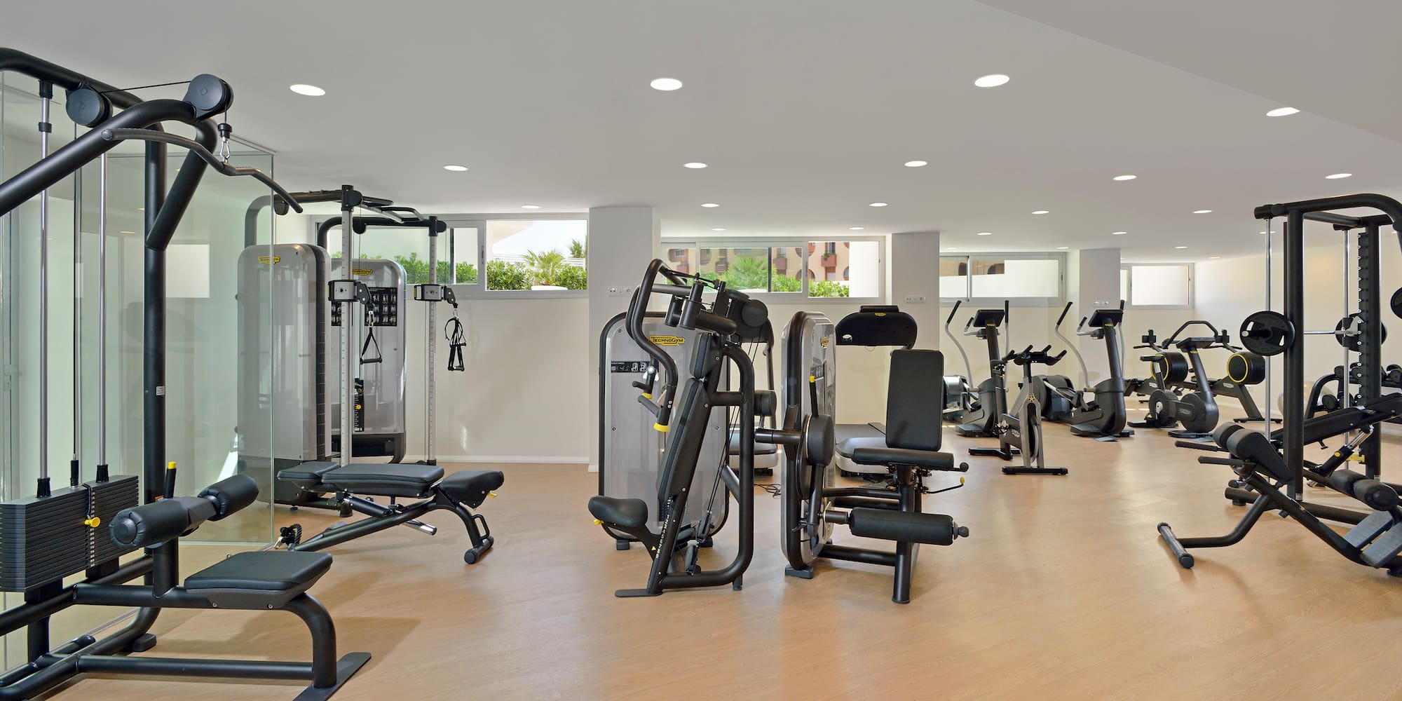 a large room with exercise equipment