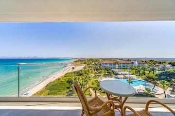 a view of a beach from a balcony