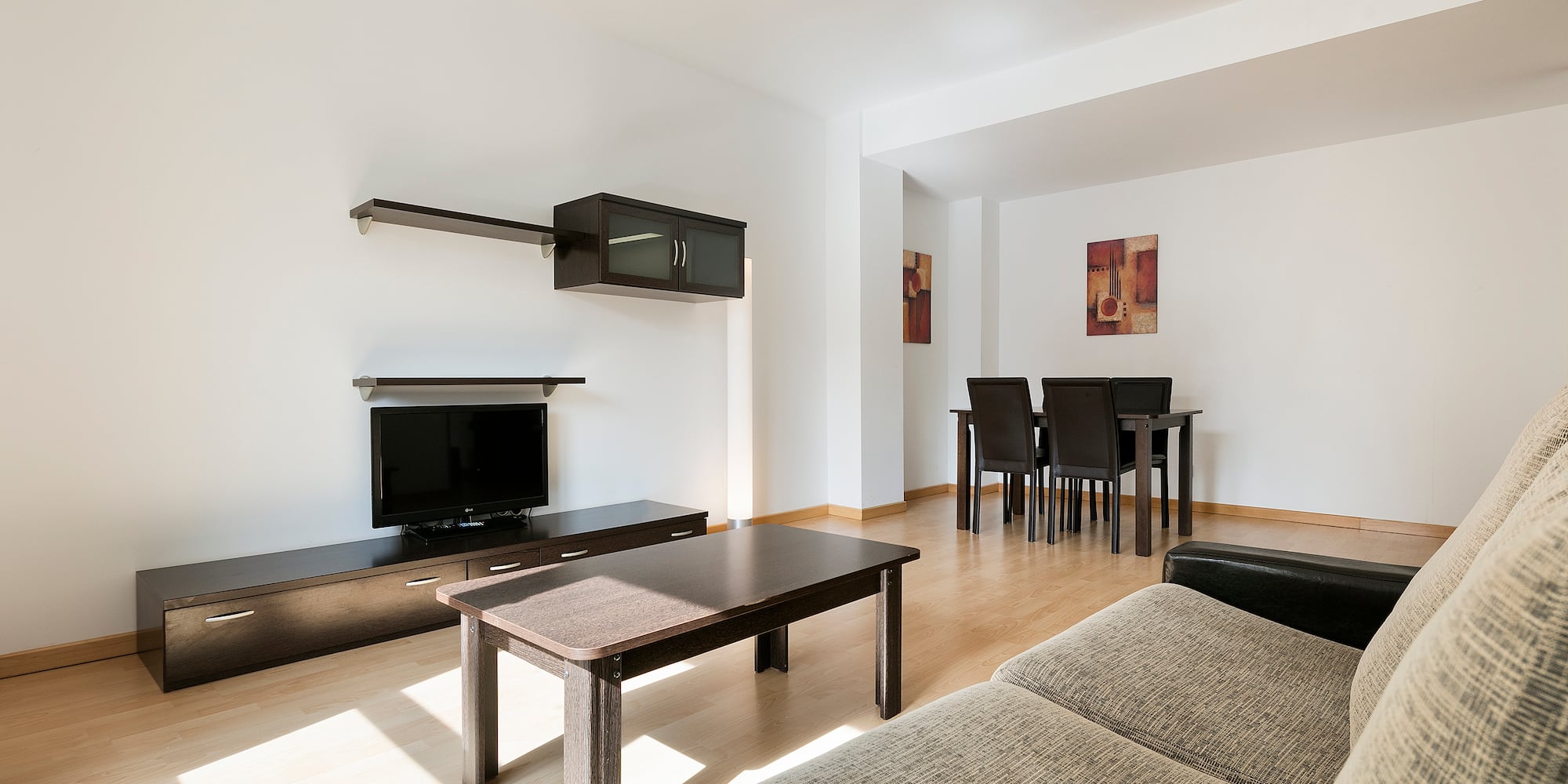 a living room with a couch and a table