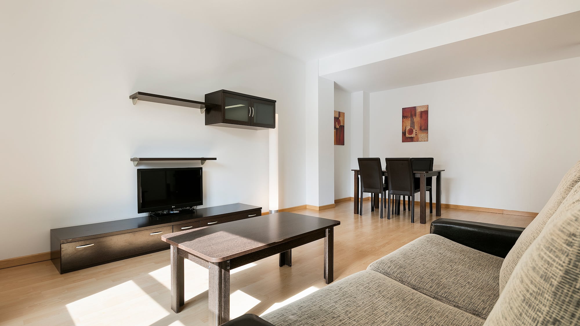 a living room with a couch and a table