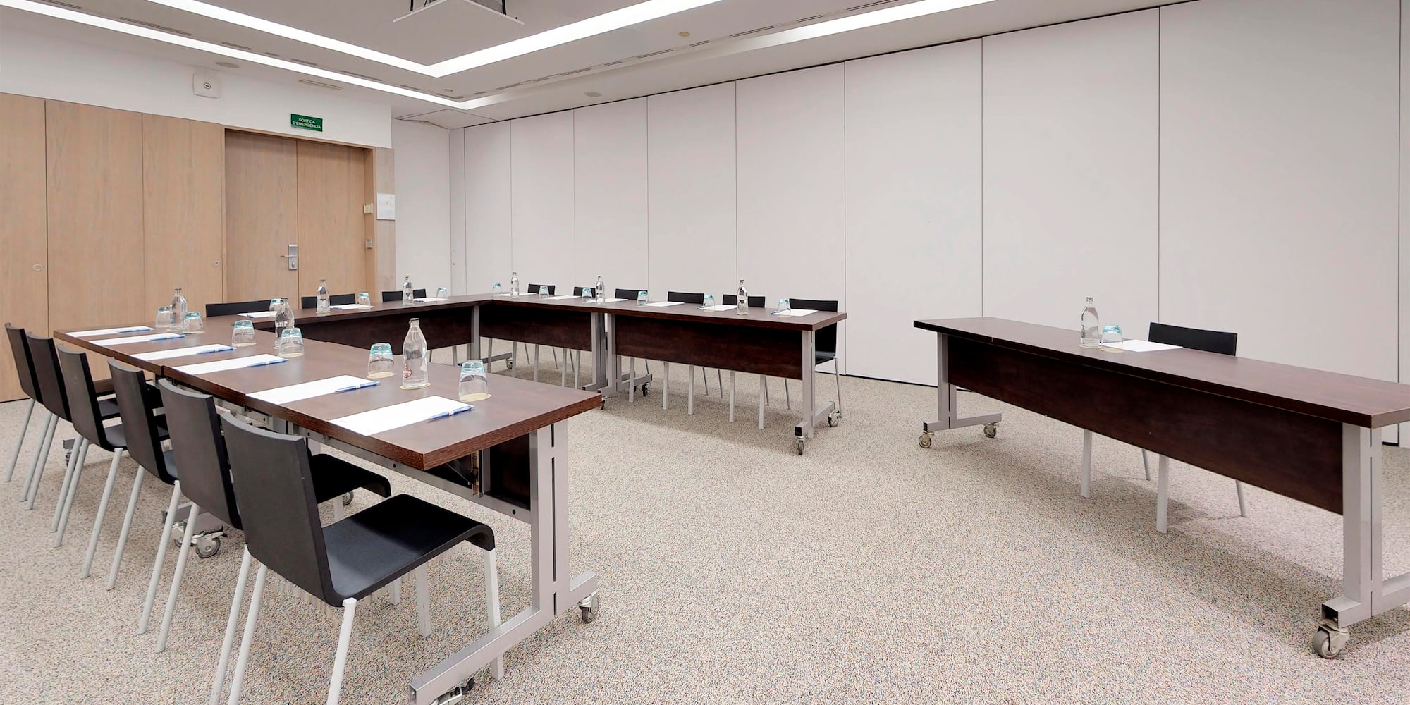 a room with tables and chairs