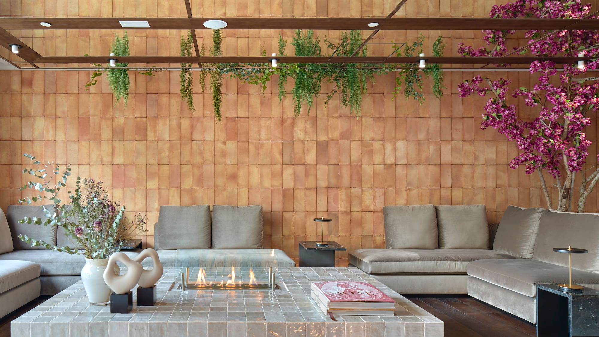a living room with a fireplace and couches