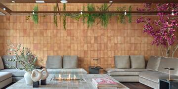 a living room with a fireplace and couches