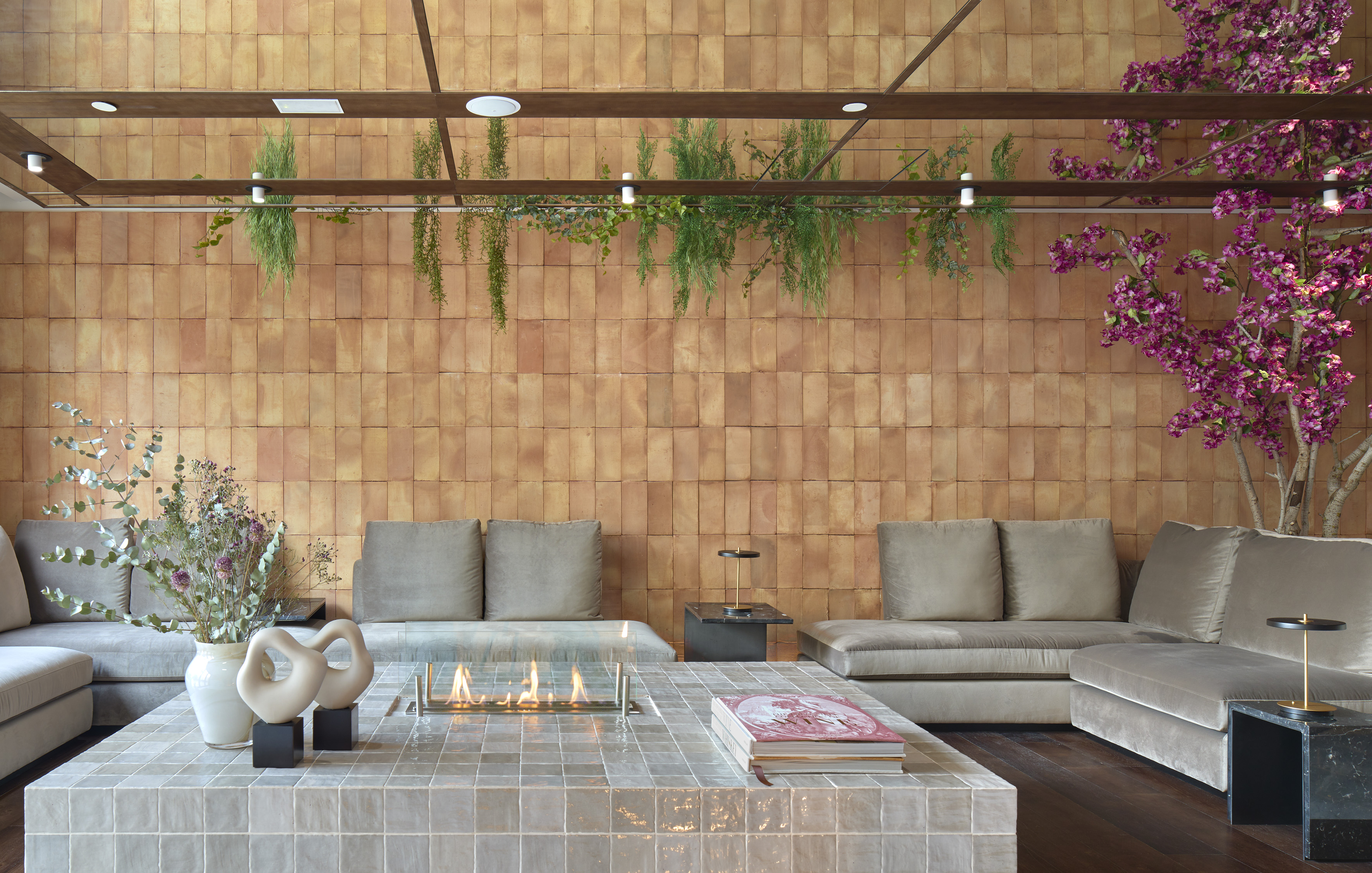 a living room with a fireplace and couches