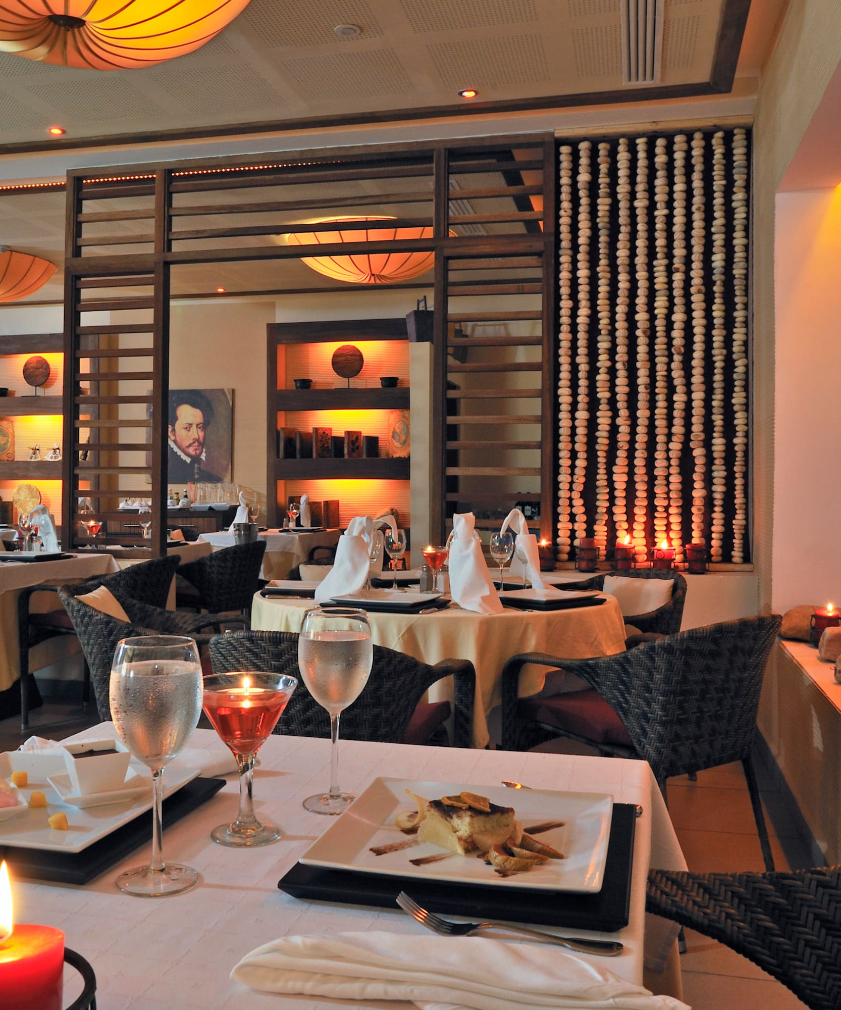 a restaurant with tables and chairs