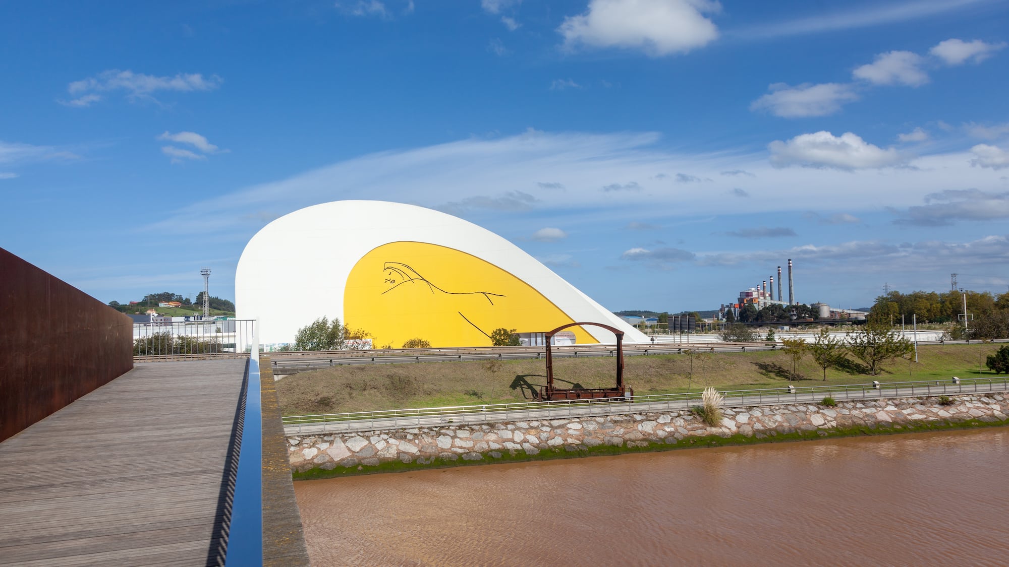 a building with a yellow and white design